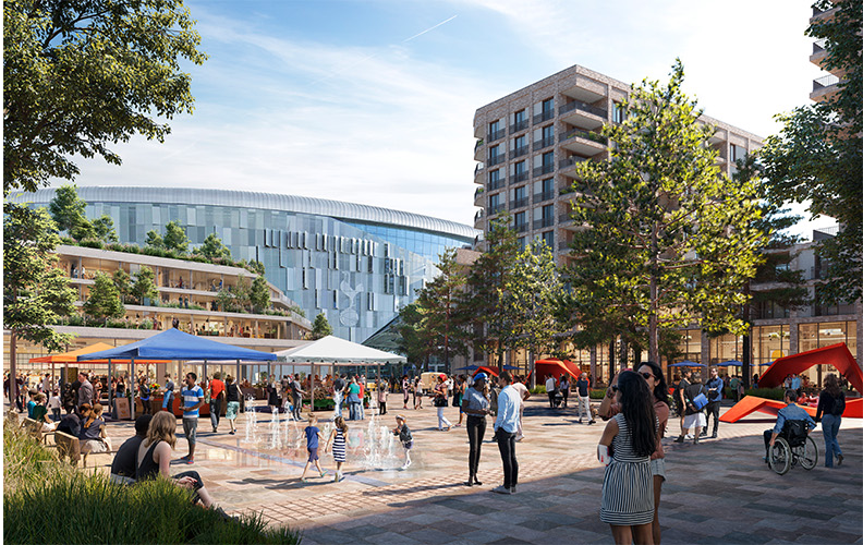 Day time image of water feature and shops